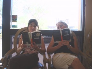 Reading the same book as we await pedicures.
